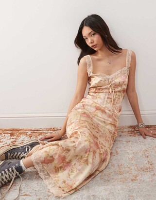 Reclaimed Vintage midi dress with asymmetric hem and ruffles in