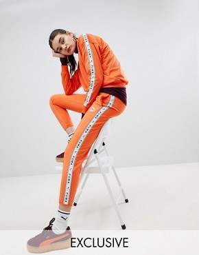 Puma Exclusive To ASOS Taped Side Stripe Track Pants In Orange
