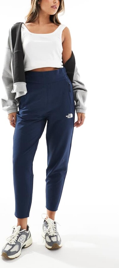 The North Face Tekware Grid track pants in summit navy