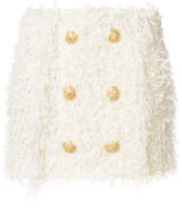 Balmain minijupe en tweed à boutons décoratifs