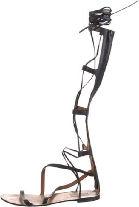 Valentino Leather Gladiator Sandals Black Rockstud Accents Studded Accents Multistrap & Zip Closures at Shafts Unfortunately, due to restrictions, this item may not be eligible for shipping in all areas.
