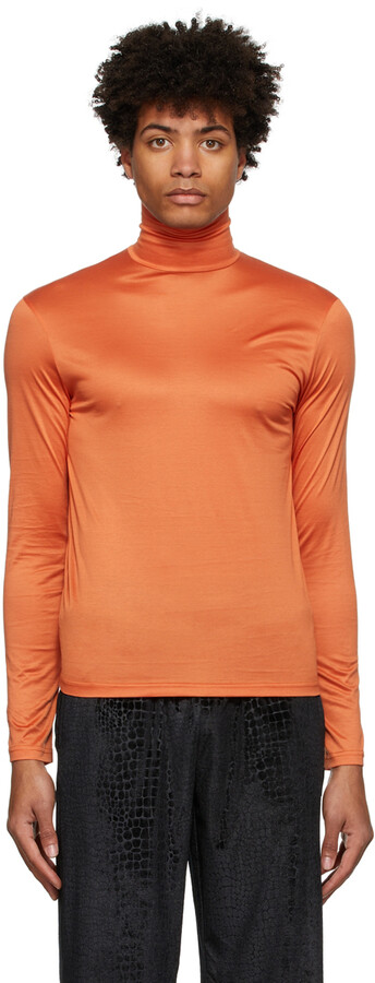 orange turtleneck top