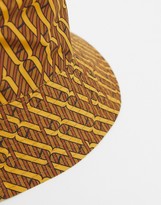 Thumbnail for your product : ASOS DESIGN two-piece wide brim bucket hat in brown and orange print