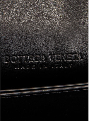 Bottega Veneta Leather Woven Crossbody Bag in Black & Gold | FWRD