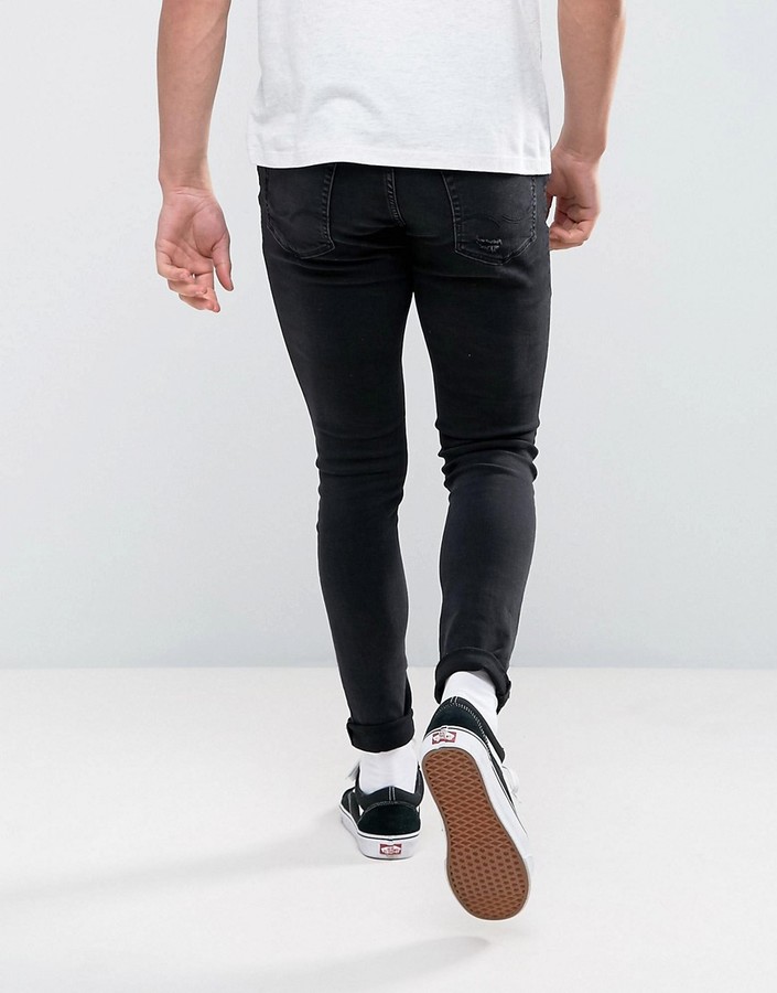 Jack and Jones Liam skinny fit ripped jeans in black wash - ShopStyle