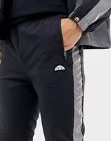 Thumbnail for your product : Ellesse Nardo Track Joggers With Relfective Side Stripe In Black