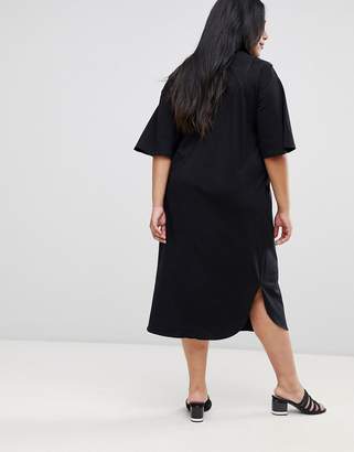 ASOS Curve DESIGN Curve high neck midi swing dress with trumpet sleeves