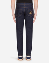Thumbnail for your product : Dolce & Gabbana Slim-Fit Stretch Jeans With Patch