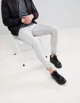 Thumbnail for your product : ASOS DESIGN Super Skinny Jeans In Light Gray With Abrasions