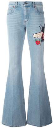 Gucci embroidered flared denim jeans