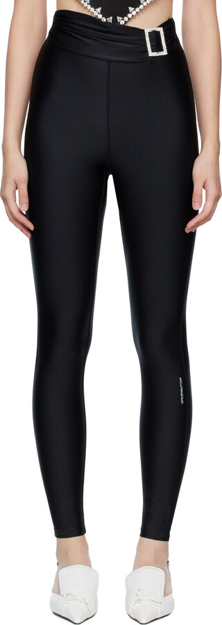 https://img.shopstyle-cdn.com/sim/3c/12/3c1205feb936a89ceb2f8b34def14bf1_best/pushbutton-ssense-exclusive-black-belted-disco-leggings.jpg