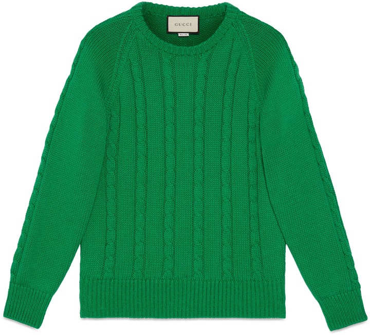 green cable knit sweater