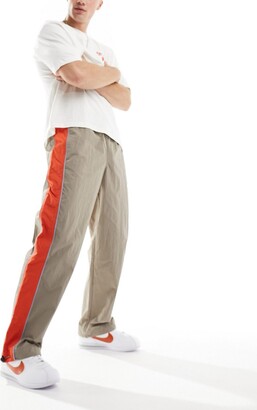 ASOS DESIGN Wide Leg Track Pants In Red With Contrast, $11, Asos