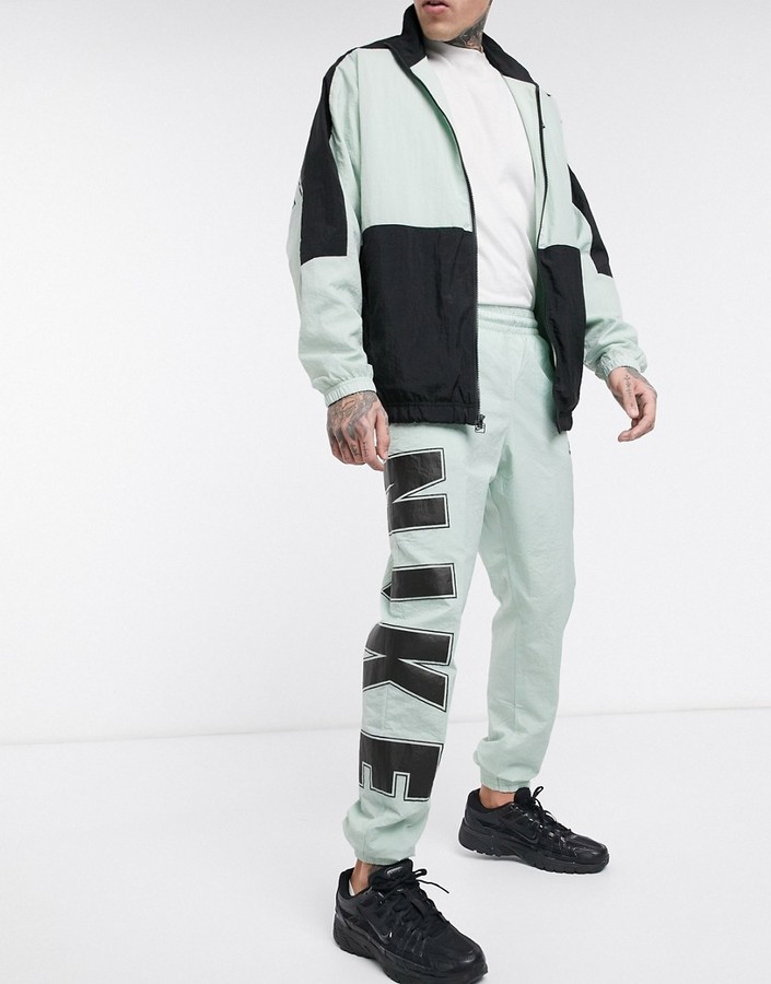 Nike Social Currency logo cuffed joggers in mint - ShopStyle Trousers