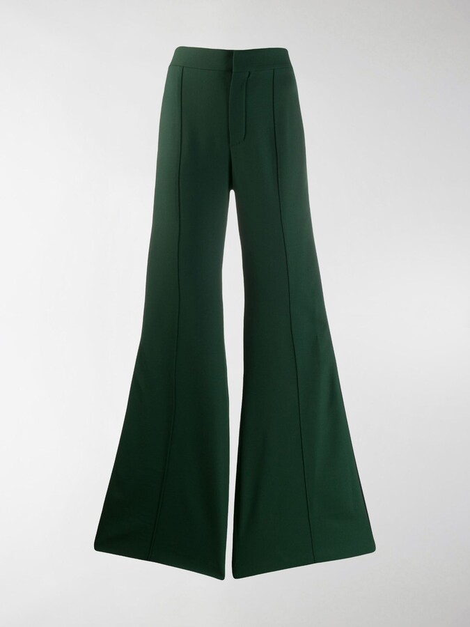 green flared trousers