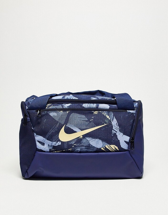 Nike Training duffle bag in blue camo 25L ShopStyle Travel Duffels & Totes