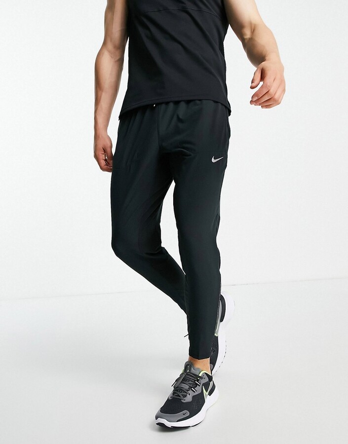Nike Running Phenom Elite Dri-FIT woven joggers in black - ShopStyle  Trousers