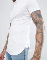 Thumbnail for your product : ASOS Design DESIGN longline muscle fit jersey polo with bound curved hem in white