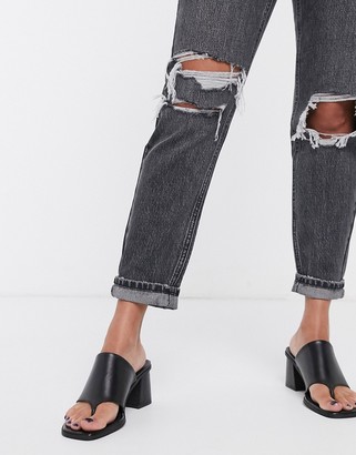 Topshop mom jeans with double knee rips in washed black
