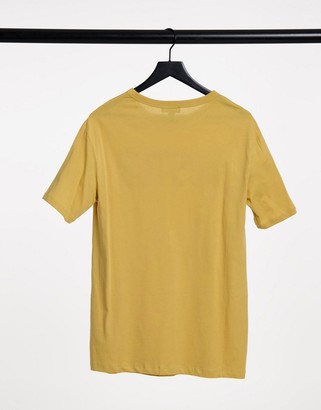 New Look Boston varsity slogan oversized t-shirt in mustard
