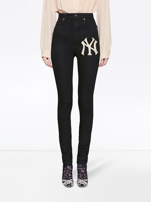 Gucci Denim skinny pants with NY Yankees patch