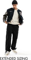 Thumbnail for your product : ASOS DESIGN oversized varsity jacket with faux leather sleeves in navy