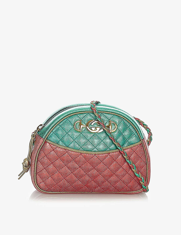 black gucci purse with green and red strap
