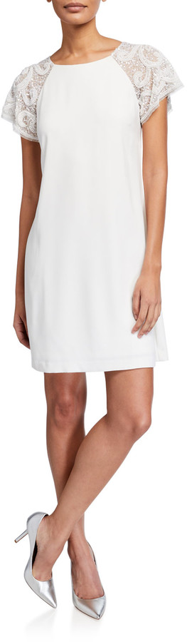 trapeze cocktail dress with sleeves