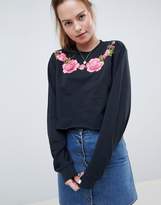 Thumbnail for your product : ASOS Design DESIGN sweatshirt with floral embroidery in washed black