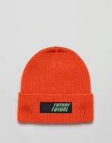 Thumbnail for your product : ASOS DESIGN oversized beanie in orange with rubber badge detail