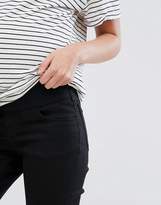 Thumbnail for your product : ASOS Maternity DESIGN Maternity Ridley high waisted skinny jeans in clean black with under the bump waistband