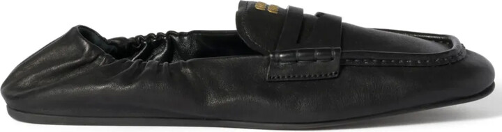 Miu Miu Embossed-Logo Loafers