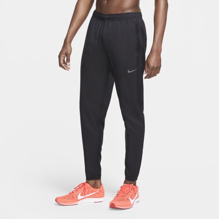 nike essential woven running pants