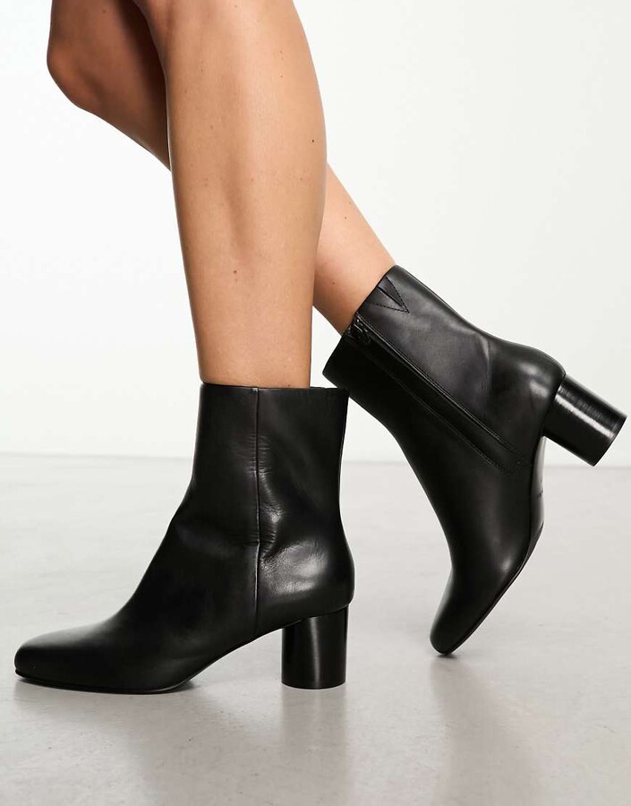 And other stories chunky sole knee high flat boots in black