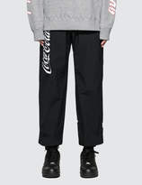 Thumbnail for your product : Coca-Cola By Atmos Lab Drd Nylon Track Pants