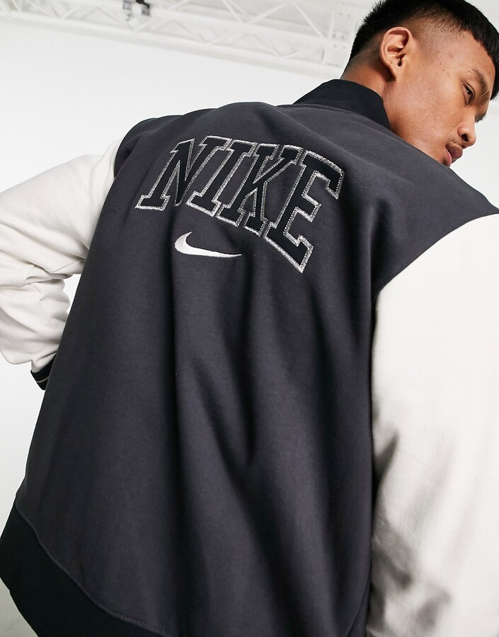 nike varsity jacket black