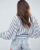 Thumbnail for your product : ASOS DESIGN batwing plunge long sleeve top in blue & white stripe