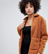 Thumbnail for your product : Missguided oversized pocket detail borg jacket in rust