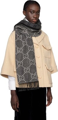 GG jacquard pattern knit scarf with tassels