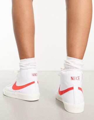 nike blazer mid 77 trainers in white and red