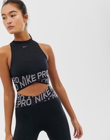 Thumbnail for your product : Nike Training Crossover Crop Top In Black