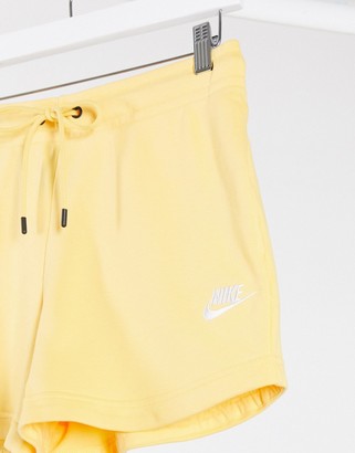 Nike essentials shorts in yellow