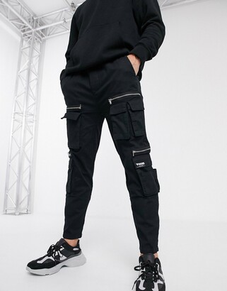 Bershka cargo pants with zip detail in black - ShopStyle Chinos & Khakis