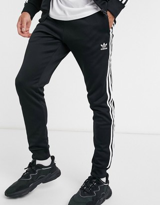 adidas sweatpants black with white stripes