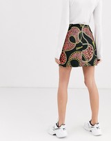 Thumbnail for your product : Monki chain print satin mini skirt in black