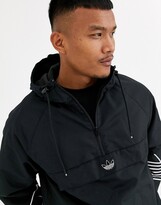 Thumbnail for your product : adidas fleece lined overhead jacket with arm trefoil print in black