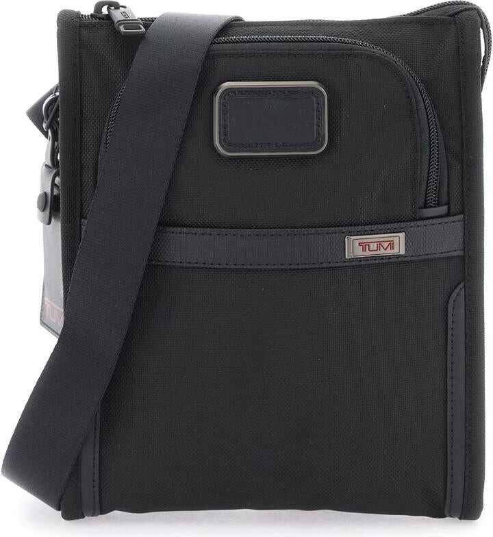 Tumi compact crossbody bag ShopStyle