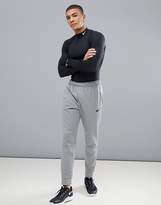 Thumbnail for your product : Nike Training therma tapered joggers in grey 800193-091