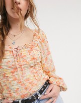 Thumbnail for your product : Free People mabel printed ruched blouse in white
