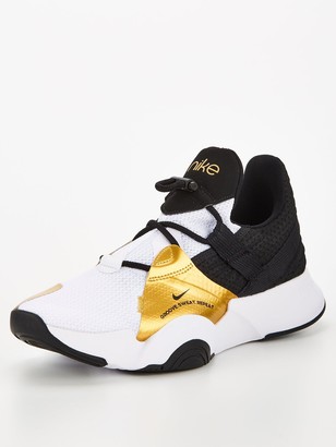 Gold And Black Nike Shoes | Shop the world's largest collection of fashion  | ShopStyle UK
